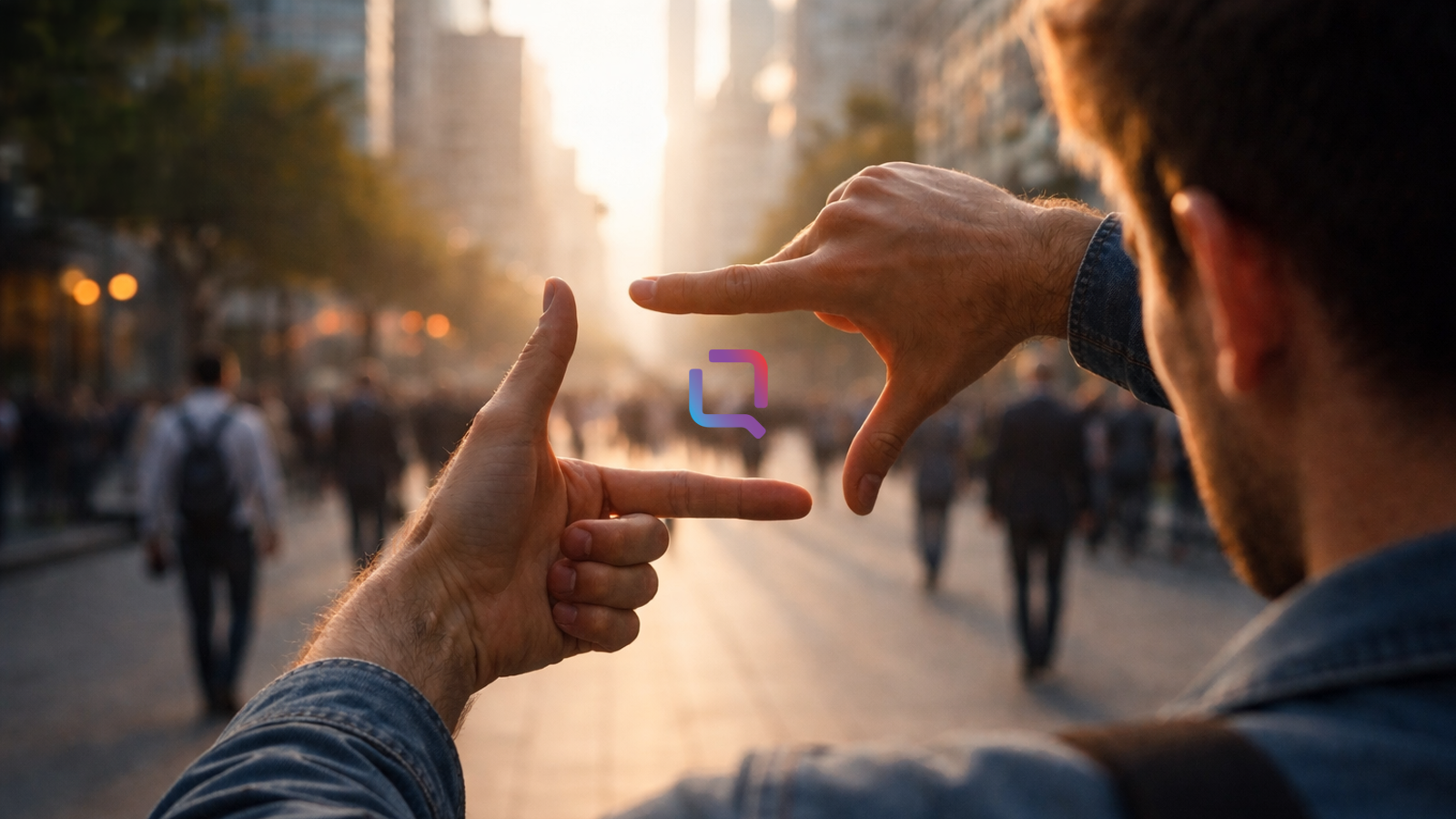 A person framing a city street with their hands, with the NotesCanvas logo visible at the center